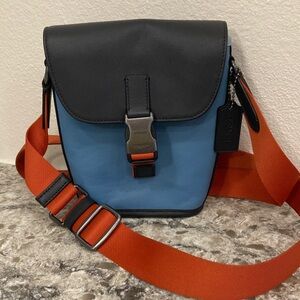 💙Coach Unisex Blue and Orange Track Messenger Crossbody Bag 
GREAT CONDITION